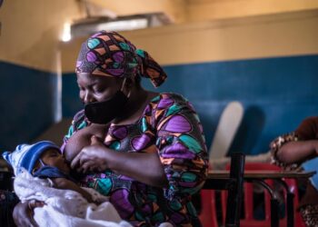 A mother breastfeeding (UNICEF)