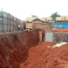 Developer Richard Munezero destroys Kamwokya houses at the Church zone because of excavation works at his construction site.