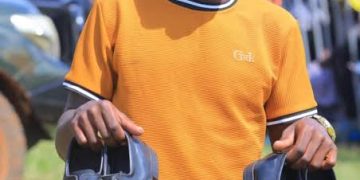 Okol of Pader District Sells “President Museveni Shoes” for His Campaigns